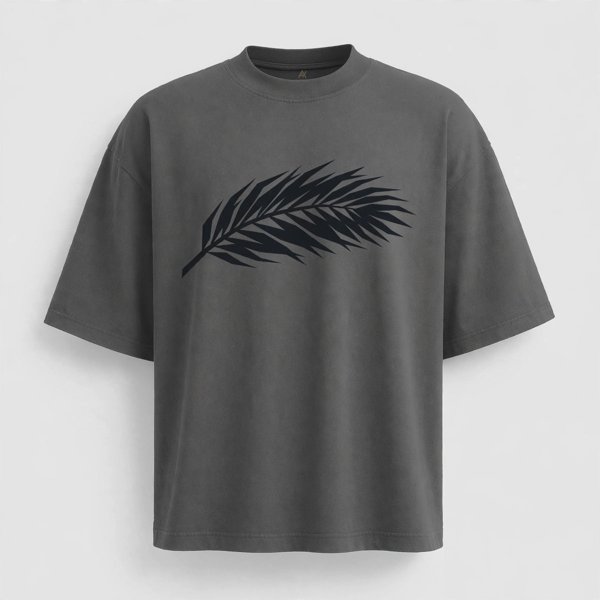 Shadow Fronda oversized tee flat lay with palm frond graphic